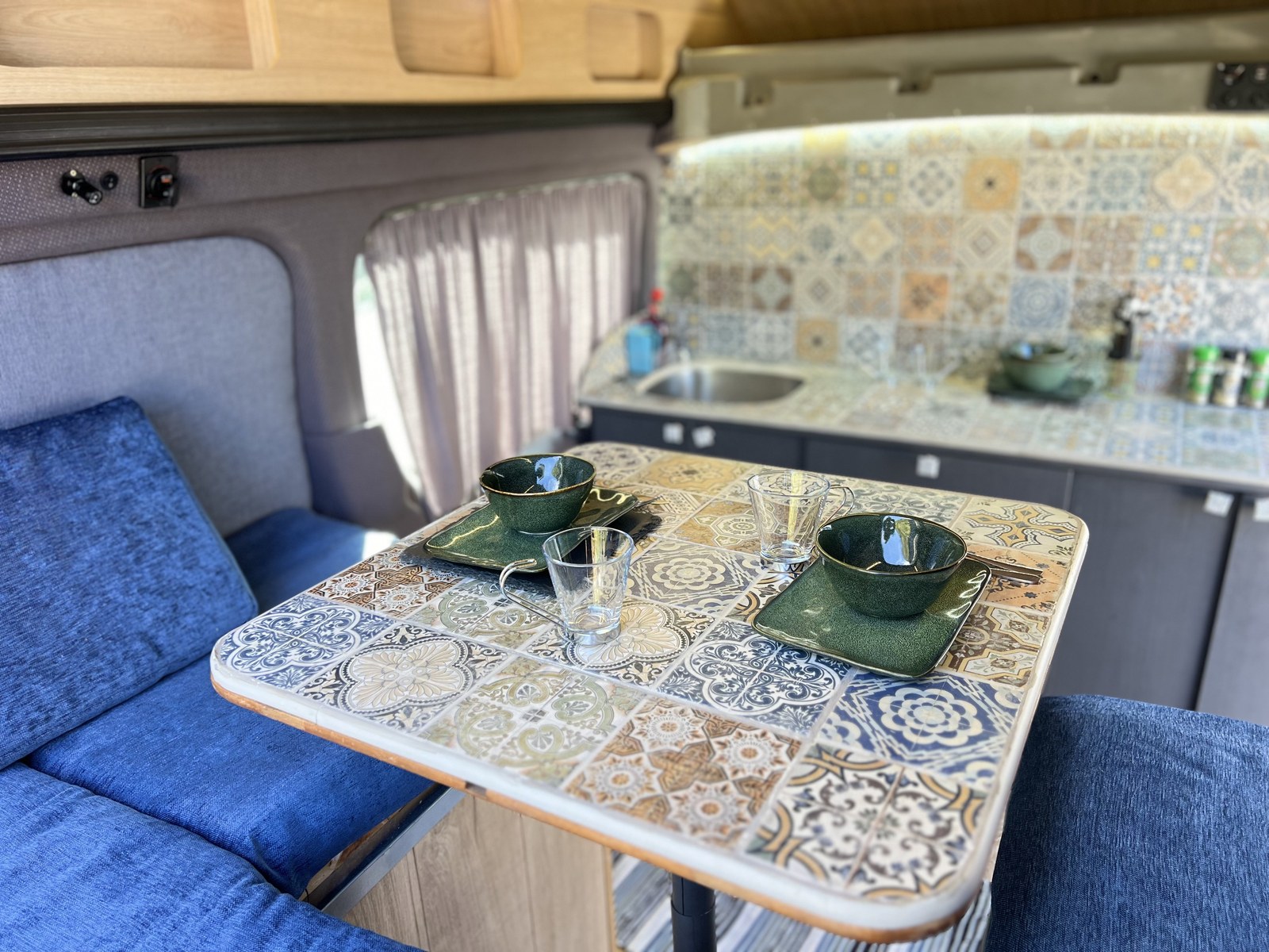 Casa da Avó dining area with mosaic table