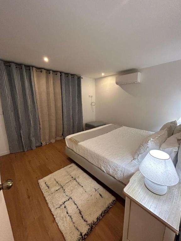 Fatima's House — bright bedroom with sea views