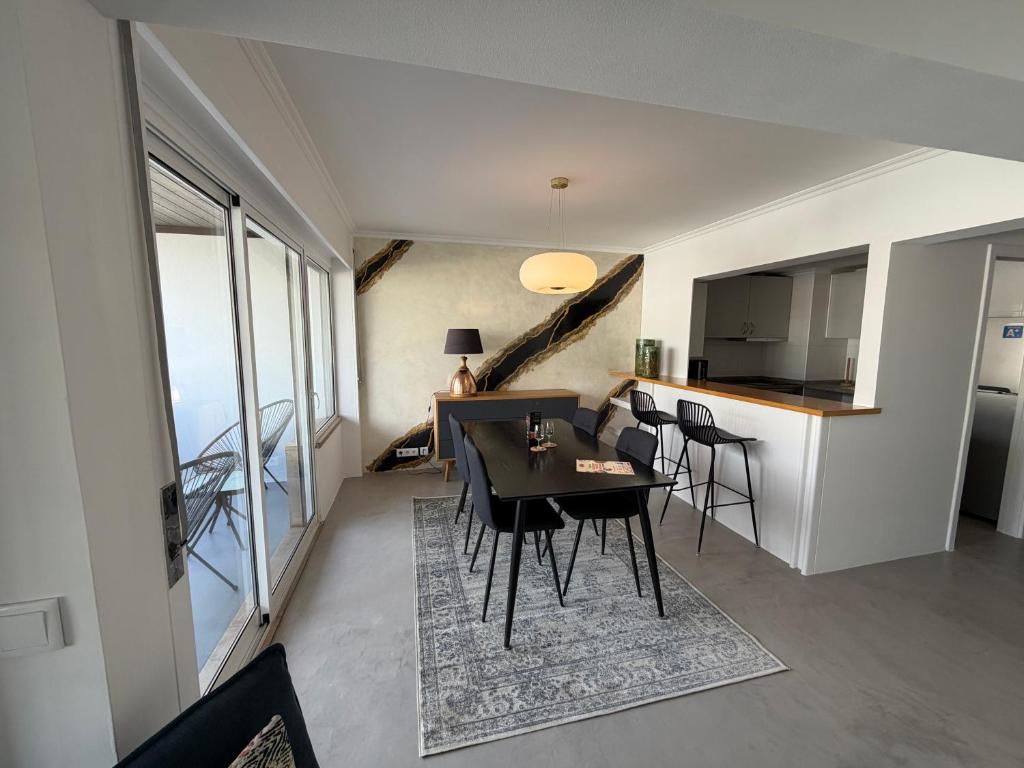 Infante Home I — private terrace with outdoor seating and city views