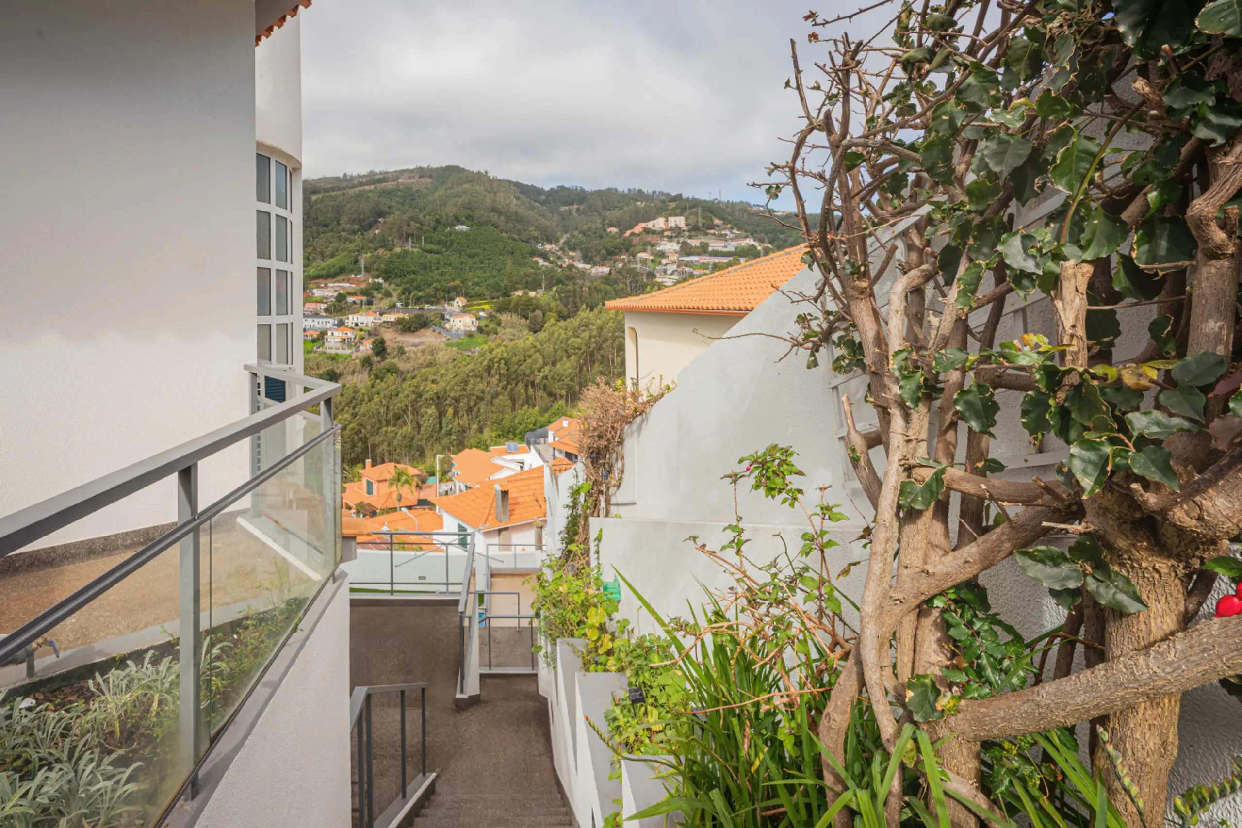 Spacious kitchen with dining table in panoramic apartment Funchal