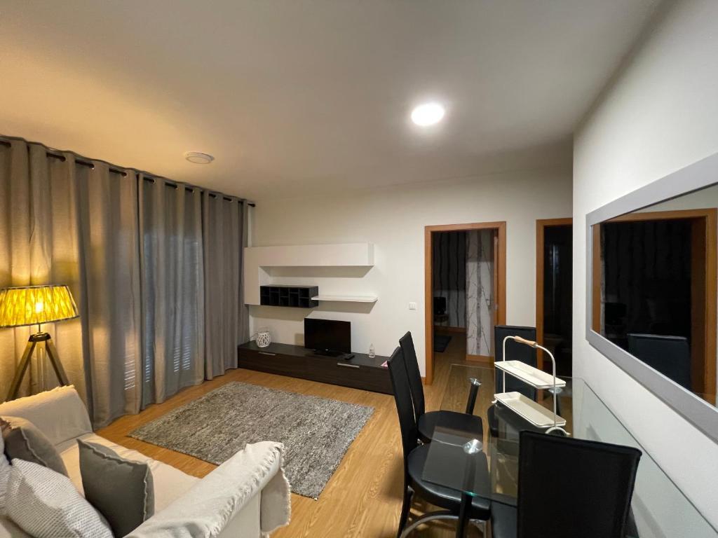 Queimada Houses – bright bedroom with blue accents