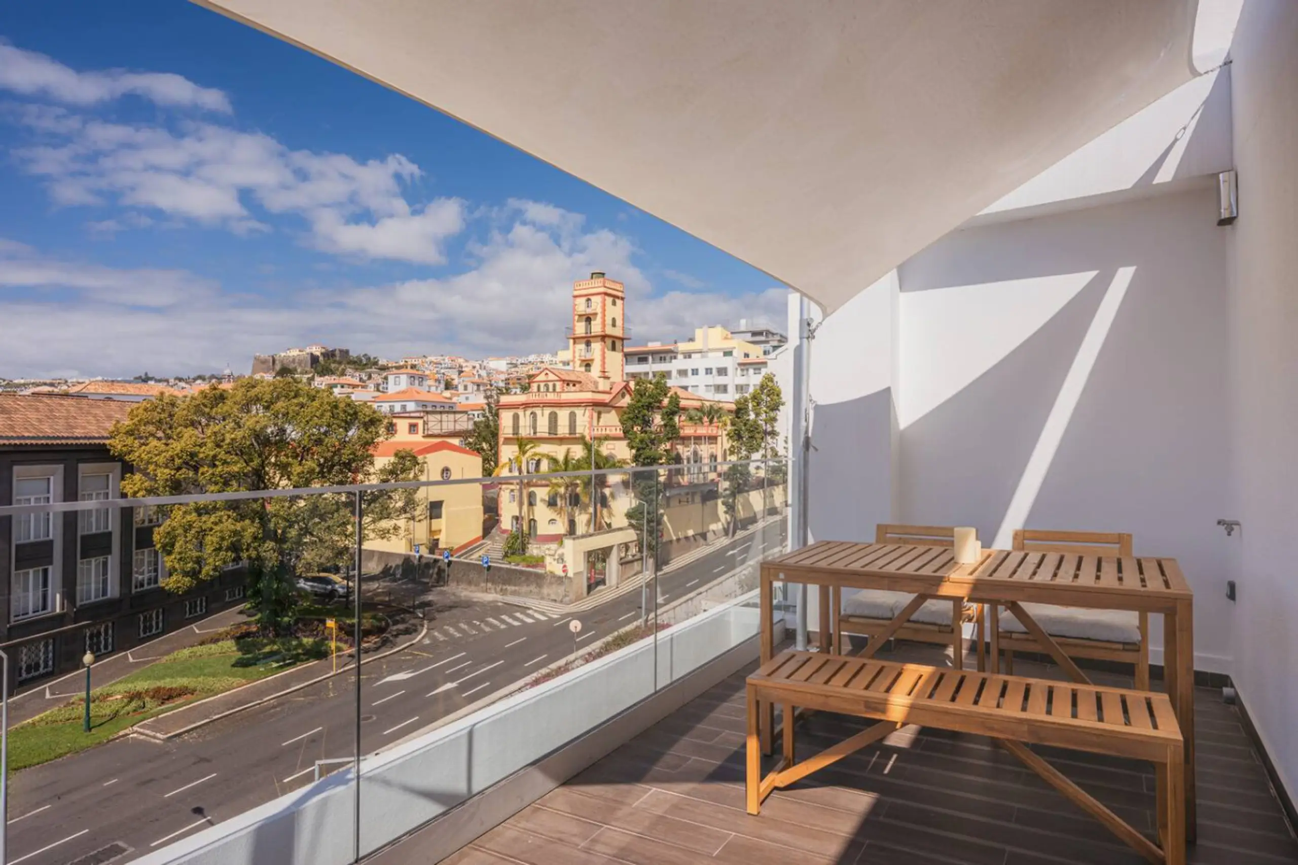 Cosy seating area and kitchen in Rooftop Studio Funchal